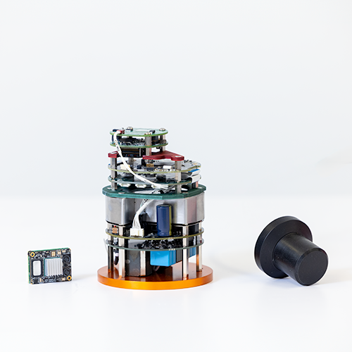 Disassembled Subnero S40H Series Silver Edition modem showing its internal electronics stack, processing board, and transducer components