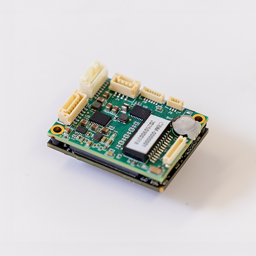 Subnero Gen4x co-processor module shown from a top-down angle, displaying its compact circuit board layout and connector headers